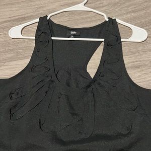 Black razor back tank with embroidered flowers on the front